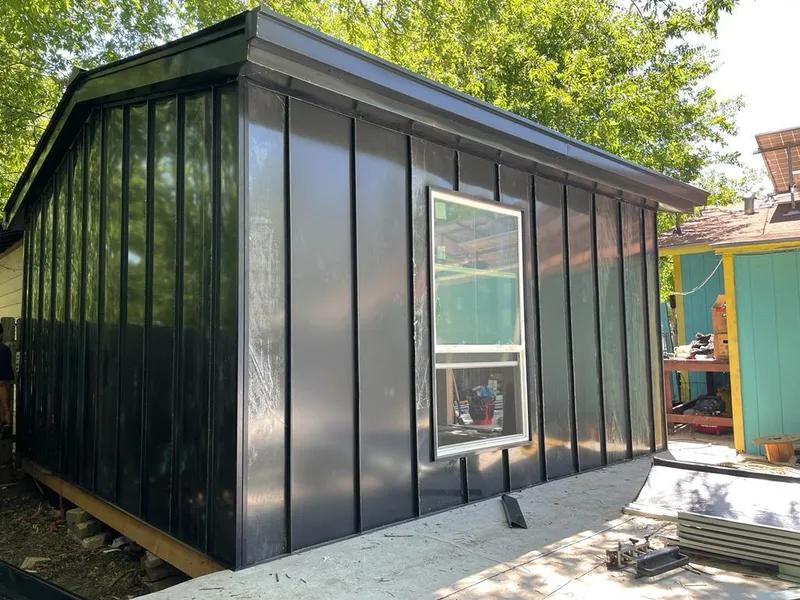 Black standing seam metal wall panels for Metal Roof Installation in Elmira