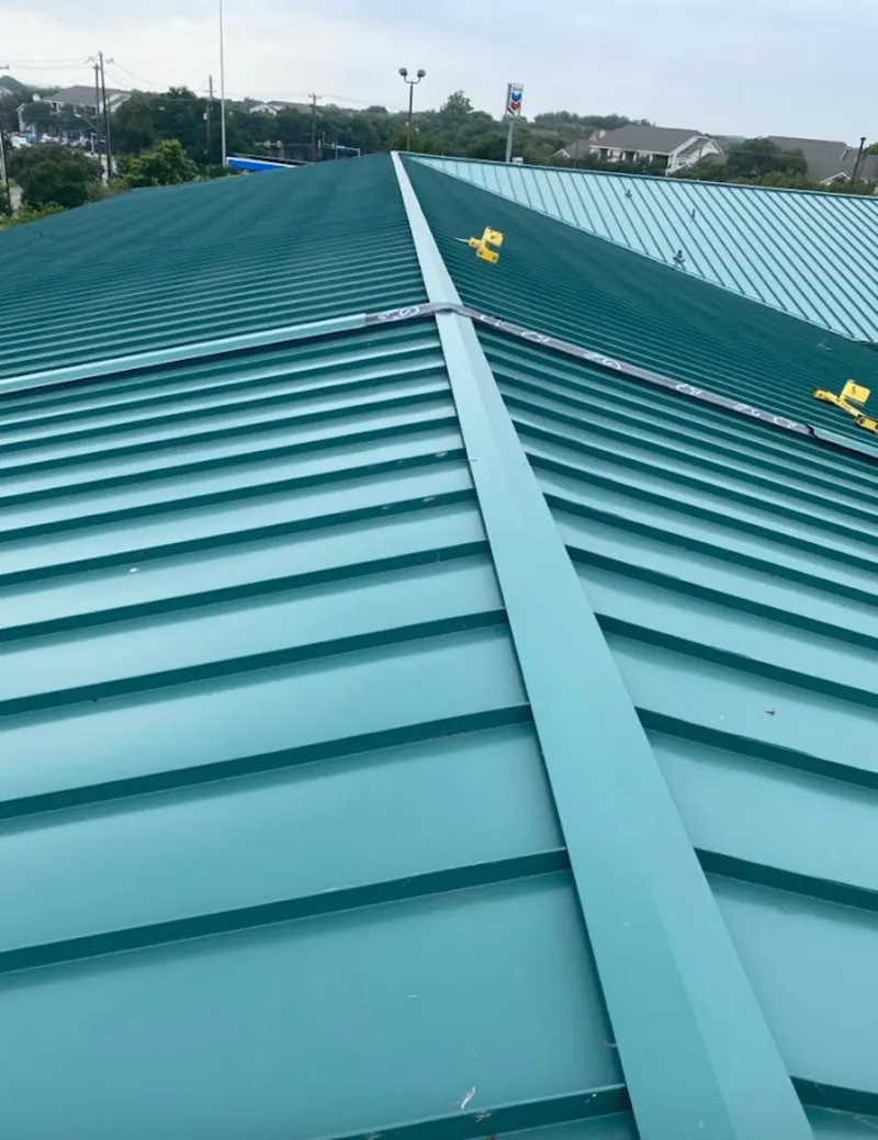 Green commercial metal roof ridge and valley for Metal Roof Repair in Elmira